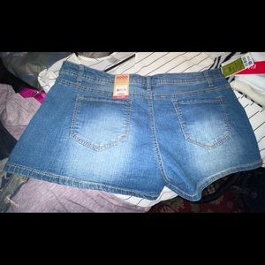 Brand new blue Jean shorts tags still attached.